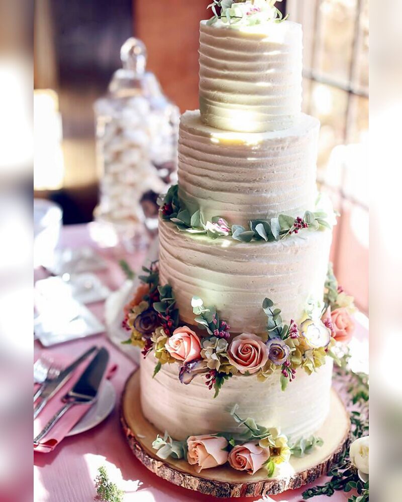 Textured buttercream with rings of garden flowers